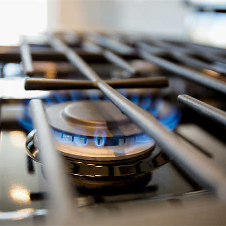 Natural gas stove with blue flames